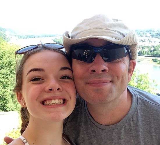 Foster carer Phil and his daughter smiling